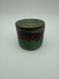 Lidded pots with green and brown glaze