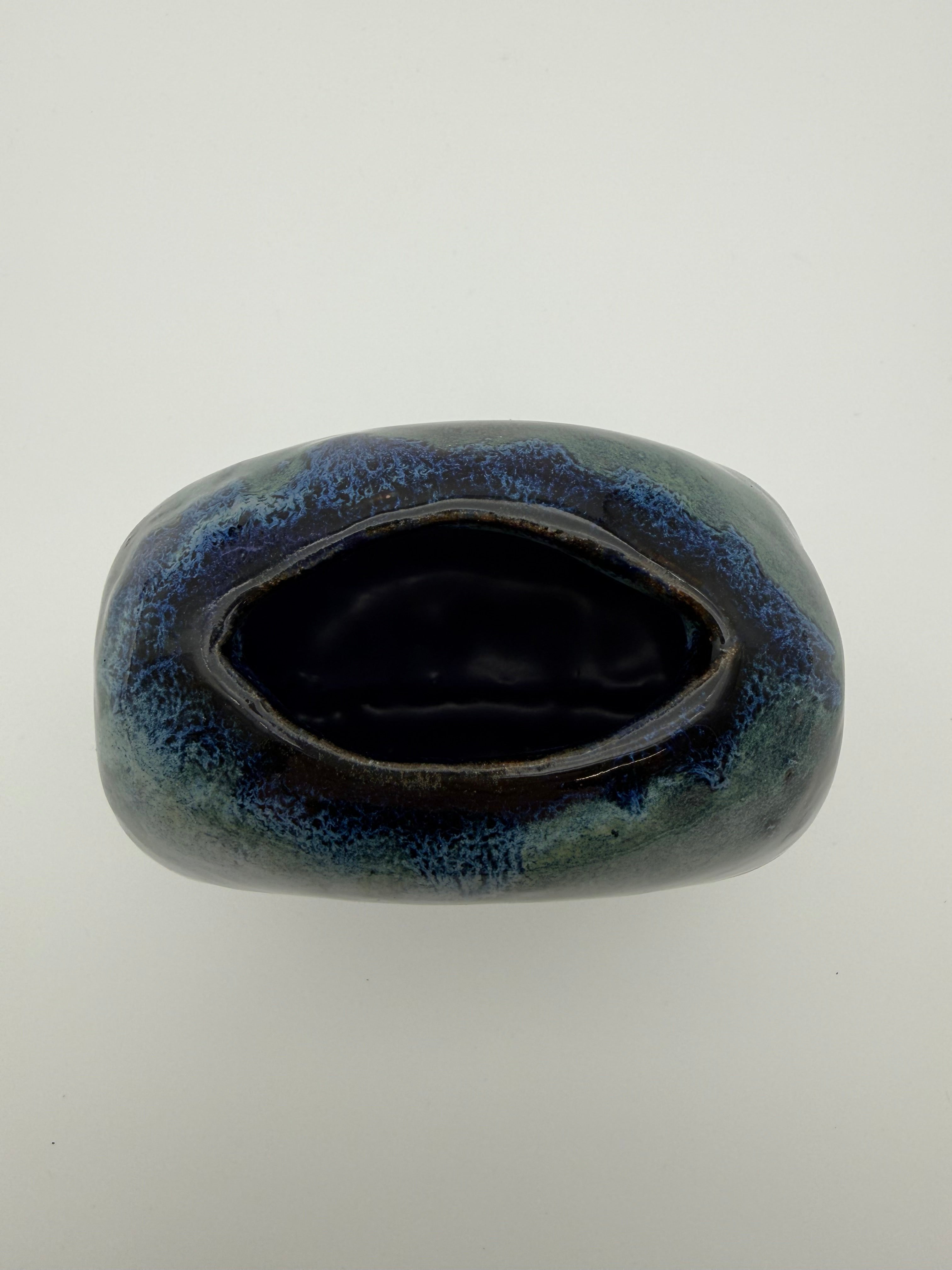 Reactive blue glazed vase
